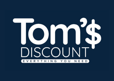 Tom's Discount new logo in white on a dark blue background