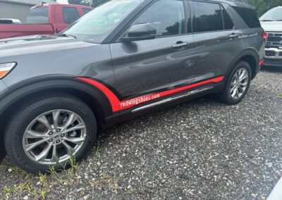 Check out the Grey Ford Explorer Limited featuring a custom decal application for Red Wing Shoes.