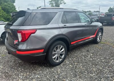 Unique vehicle graphic featuring Red Wing Shoes installed on a grey Ford Explorer by Philadelphia area company Green House Graphix.